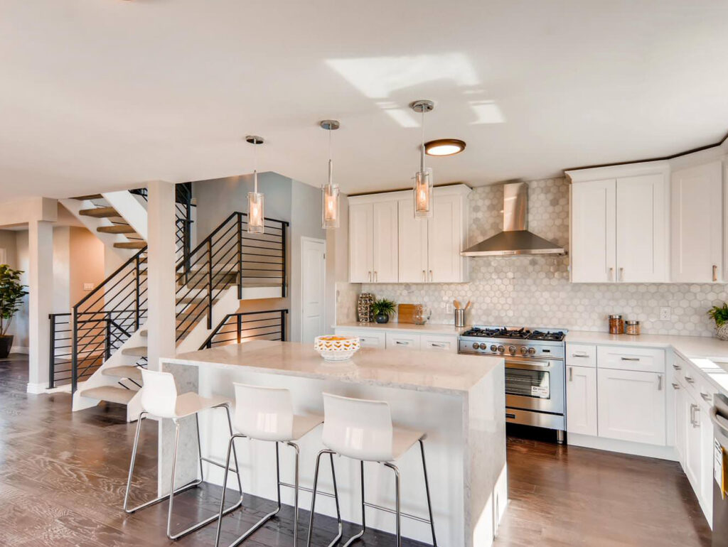 Dark-toned kitchen with contrasting countertop